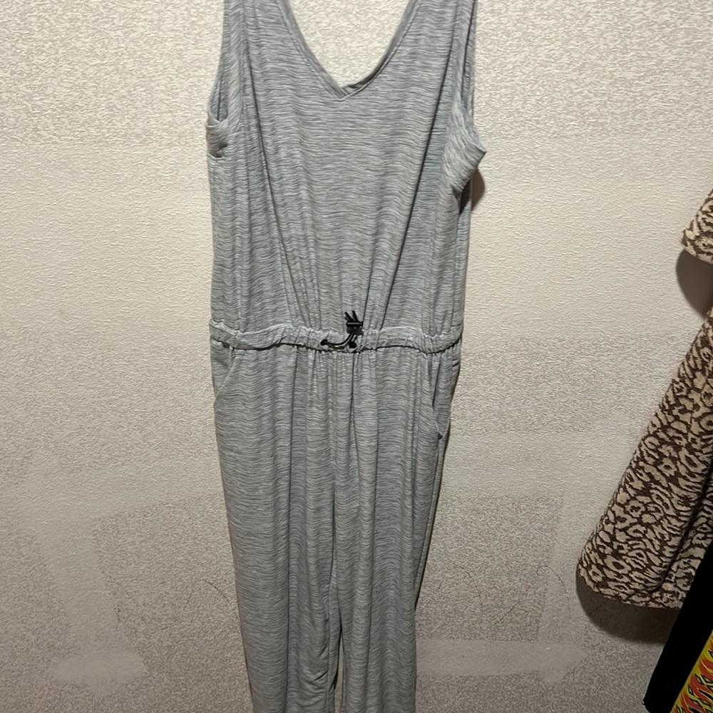 The brand of this romper is Old Navy active. The size is a small